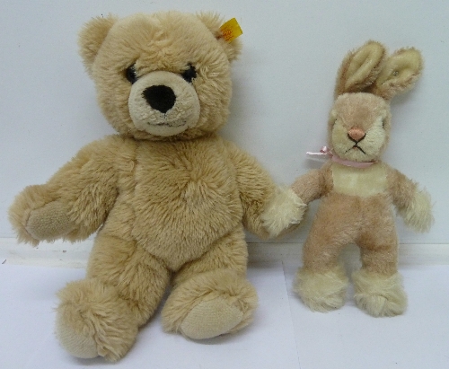 A Steiff Teddy bear and a rabbit