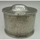 A hammered pewter Arts and Crafts caddy