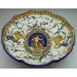 A fruit bowl decorated with two mermaids and Neptune, diameter 26.