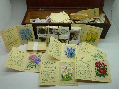 A collection of cigarette cards including approximately seventy Kensitas Flowers,