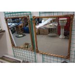 A pair of gilt framed mirrors