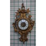 A West German Rococo style gilt wall clock