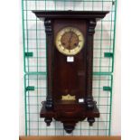 A 19th Century beech Vienna wall clock