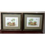 A pair of tiles with transfer printed scenes of exotic birds,