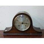 An oak mantel clock