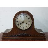 An oak mantel clock