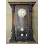 A 19th Century beech Vienna wall clock