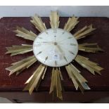 A German Kienzle Tim automatic sun burst wall clock