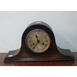 An oak mantel clock