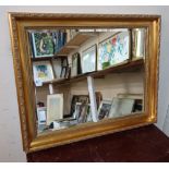 A gilt framed mirror