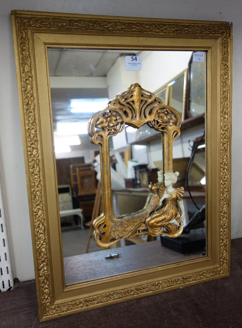 An Art Nouveau gilt framed mirror