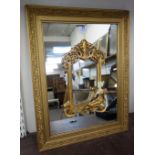 An Art Nouveau gilt framed mirror