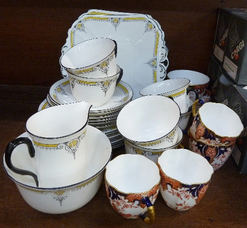 A Shelley 11205 pattern six setting coffee set, four Royal Crown Derby coffee cups and saucers,