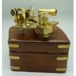 A reproduction brass sextant,