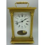 A Schmid 8-day brass carriage clock with German striking movement