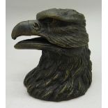 A bronze eagle head inkwell,