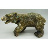 A bronze figure of a bear,