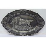 A WMF Art Nouveau plated tray with embossed scene of a retriever with a game bird to the centre,