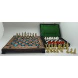 A miniature chess set and a travel chess set