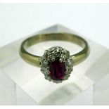 An 18ct gold, diamond and ruby ring, weight 4.