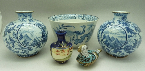 A pair of oriental blue and white vases, a Yuan pattern bowl,