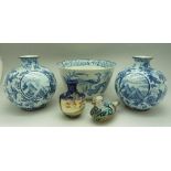 A pair of oriental blue and white vases, a Yuan pattern bowl,