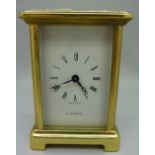 A French brass four glass sided carriage clock