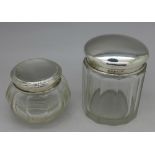 Two silver top jars