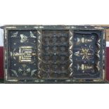 A Moroccan Berber door inset with camel-bone and white metal motifs including Jewish menorah,