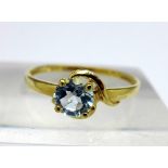 A 9ct gold and blue topaz ring, weight 0.