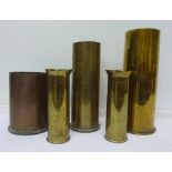 Five shell case vases,