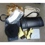 A collection of vintage handbags, gloves,