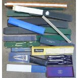 A collection of slide rules and drawing instruments