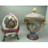 A decorative egg trinket pot and a vase with cover