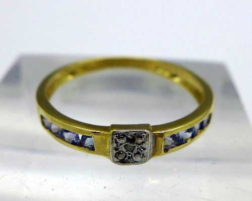 A 9ct gold, diamond and blue stone ring, weight 1.