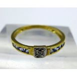 A 9ct gold, diamond and blue stone ring, weight 1.