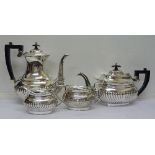 A matched gadrooned four piece plated tea service