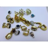 Thirteen pairs of earrings, including Christian Dior,