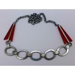 An Art Deco chrome and Bakelite necklet