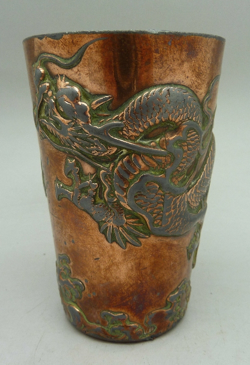 A Meiji period Chinese metal beaker, decorated with a dragon,