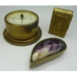 A brass snuff box in the form of a mussel shell,