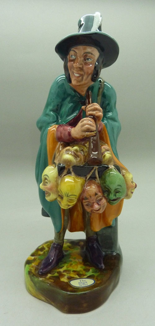 A Royal Doulton figure, The Mask Seller, HN2103, with box,