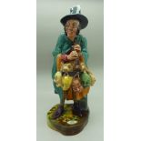 A Royal Doulton figure, The Mask Seller, HN2103, with box,