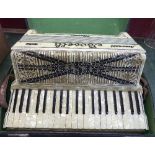 A cased Boselli accordion