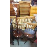 A mahogany wine table and a standard lamp