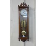 A Vienna regulator style mahogany wall clock with German movement