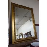 A gilt framed mirror