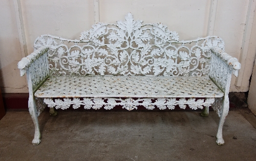 A Coalbrookdale style cast iron garden bench,