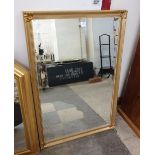 A gilt framed mirror