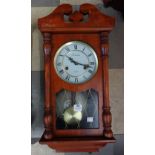 A mahogany Timemaster 31 day clock